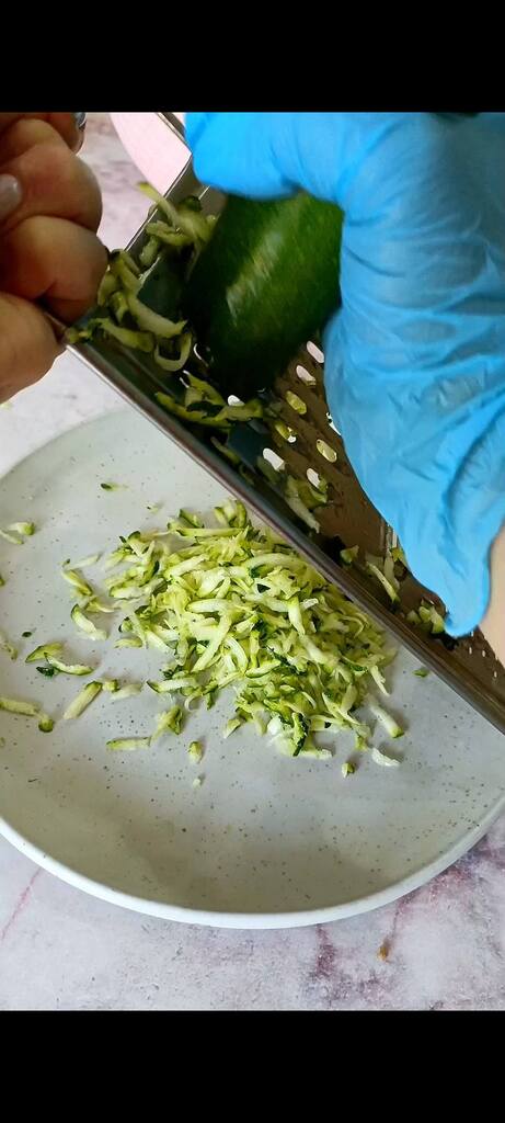 Grating the zucchini