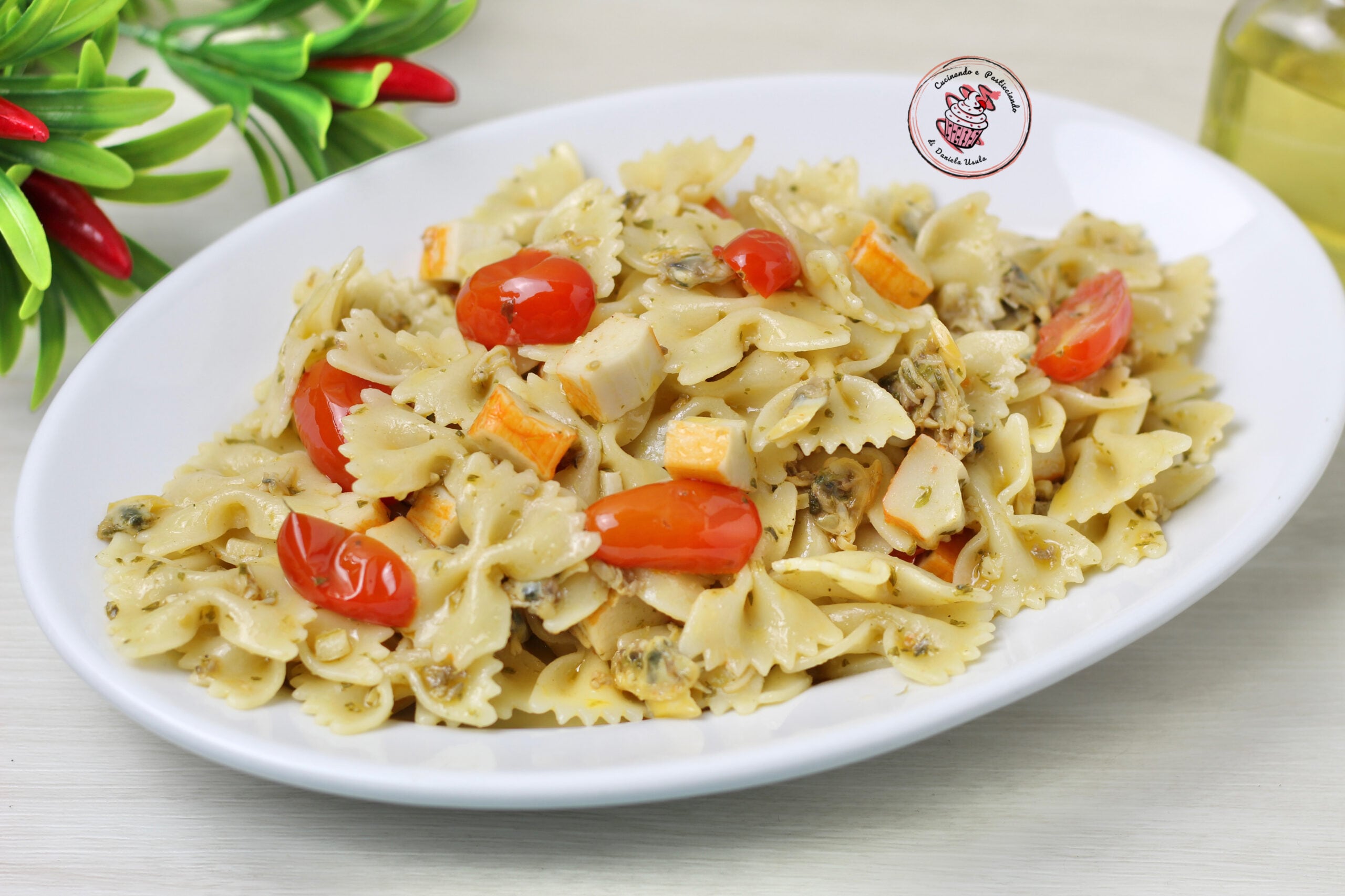 COLD PASTA WITH CLAMS, CHERRY TOMATOES, AND SURIMI: the summer recipe with a sea scent