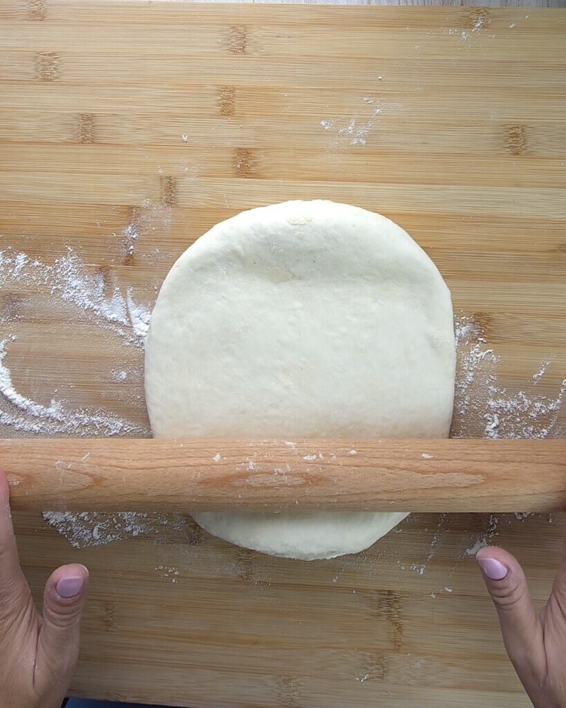roll out the dough with a rolling pin