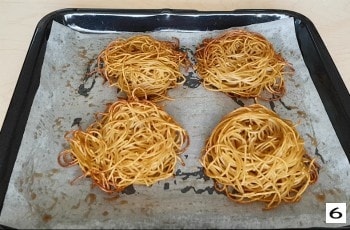 freshly baked spaghetti nests