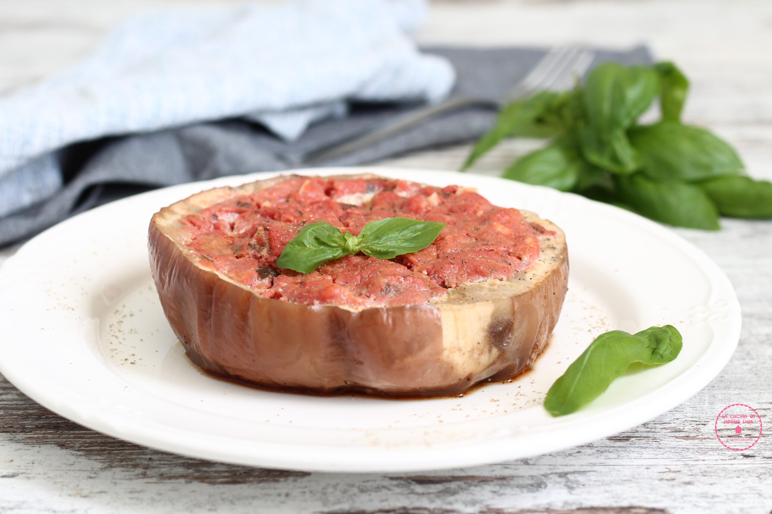 Stuffed Eggplants with Tomato in Skillet