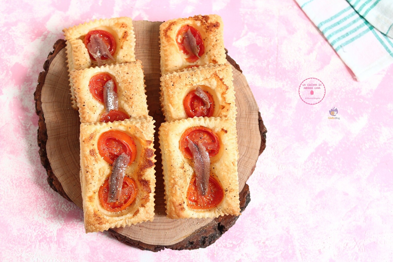 Quick Mini Pizzas with Anchovies and Cherry Tomatoes