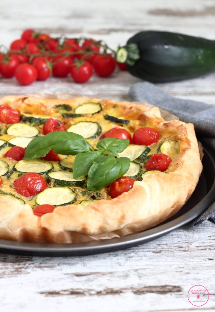 Summer savory pie with zucchini and cherry tomatoes