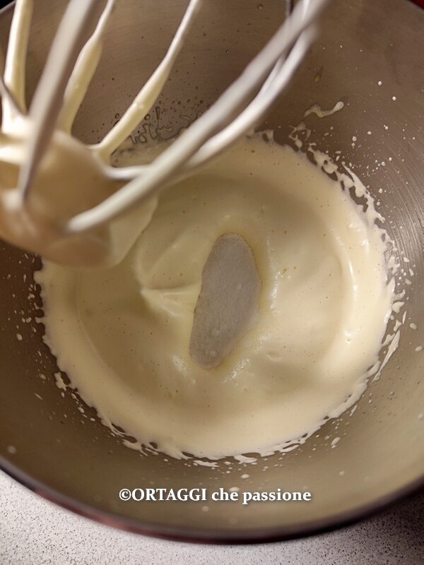beaten yolks with hot water and then sugar