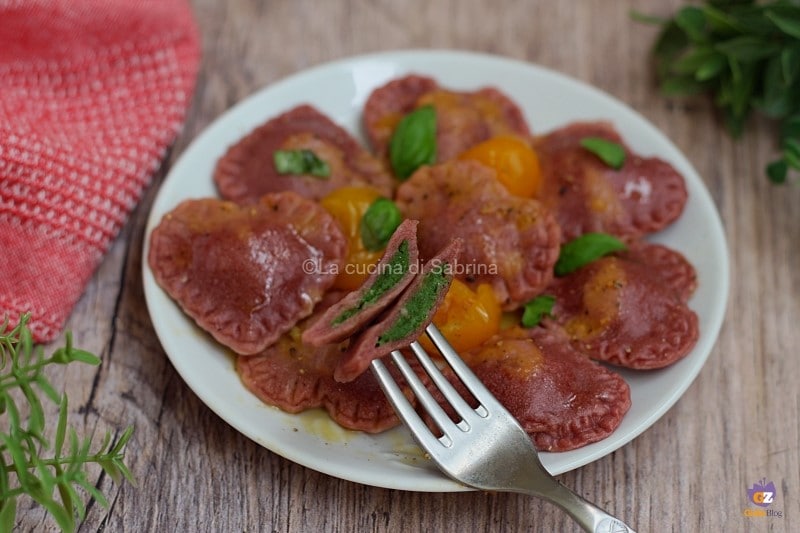 pink ravioli with lean filling