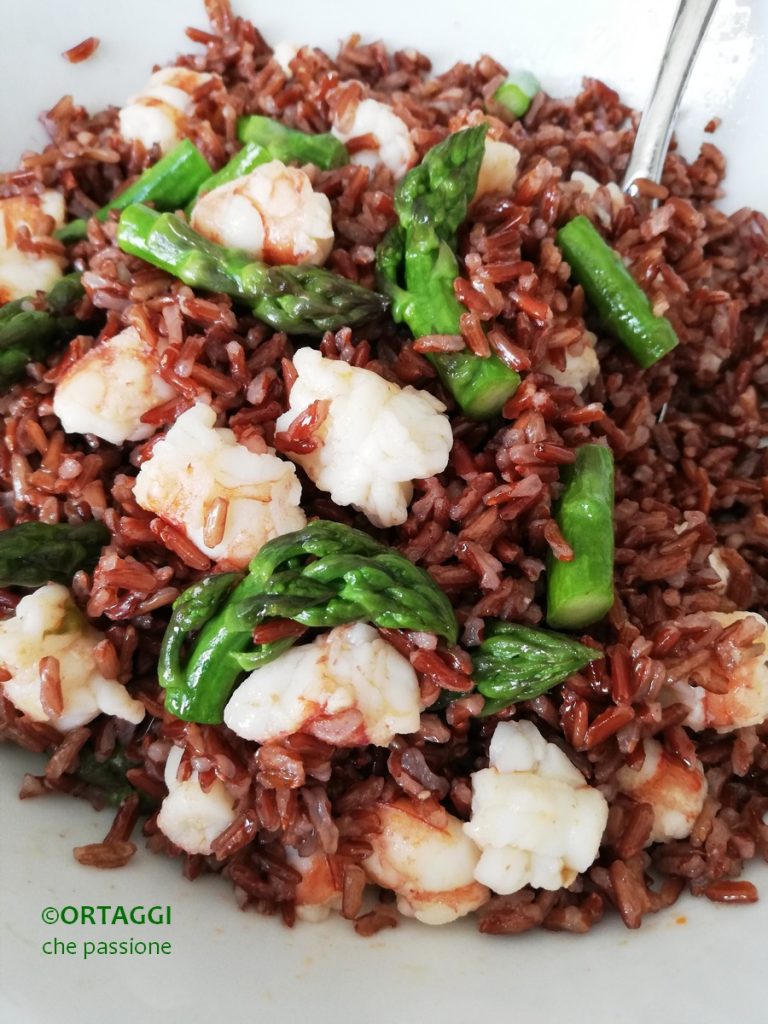 red rice with fish - shrimp and asparagus