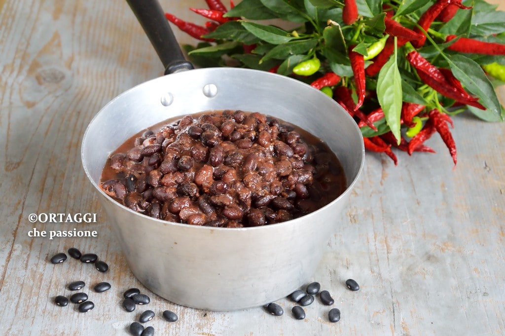 Stewed black beans cooked in a pot