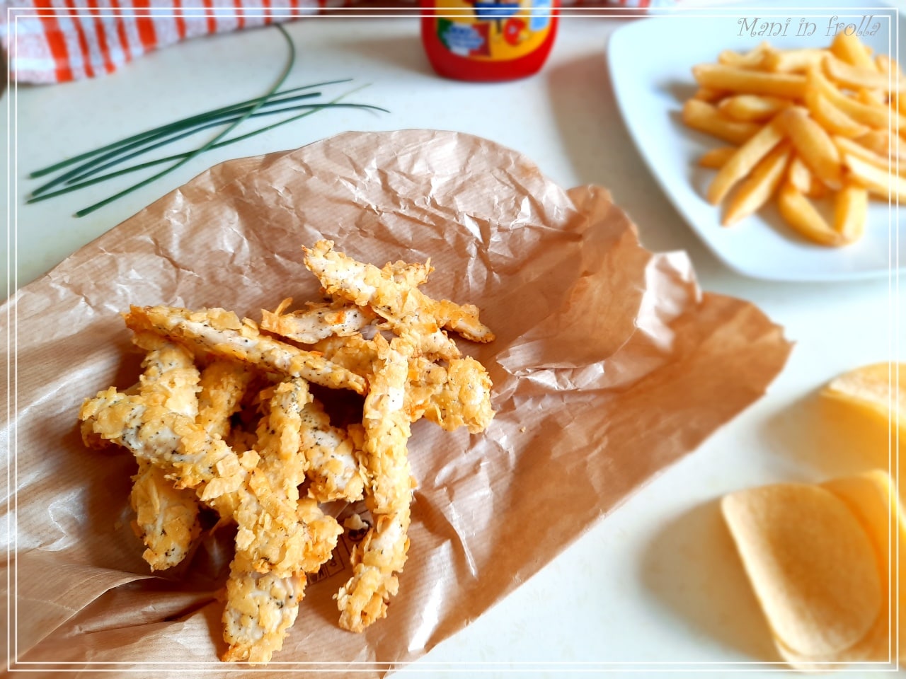 Oven-Baked Chicken Sticks with Chips Crust
