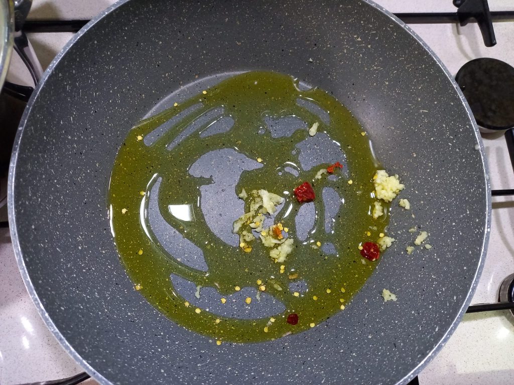 garlic, oil, and chili pepper