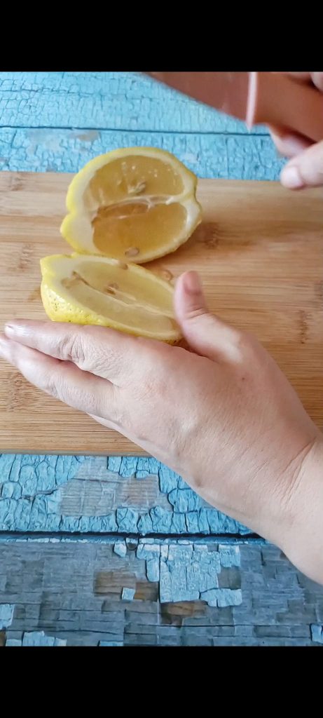 Cut the lemons in half