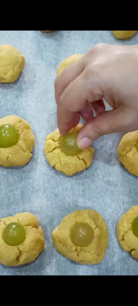 Add a grape to each ball