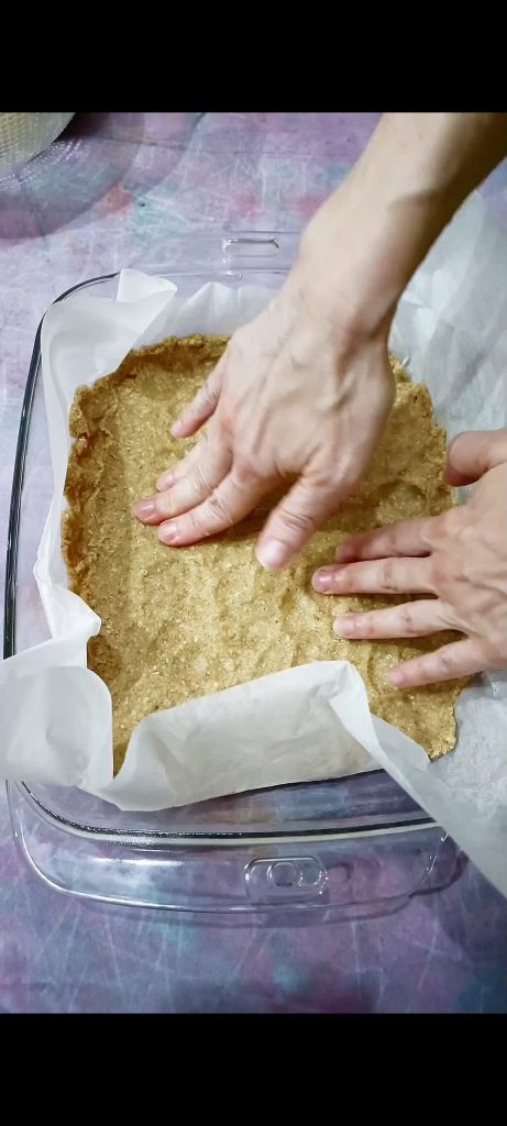 Pouring dough into a rectangular pan
