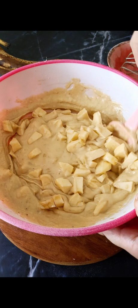 Adding apples to the batter