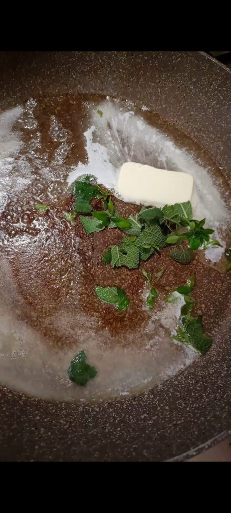 Melt the butter with sage and basil
