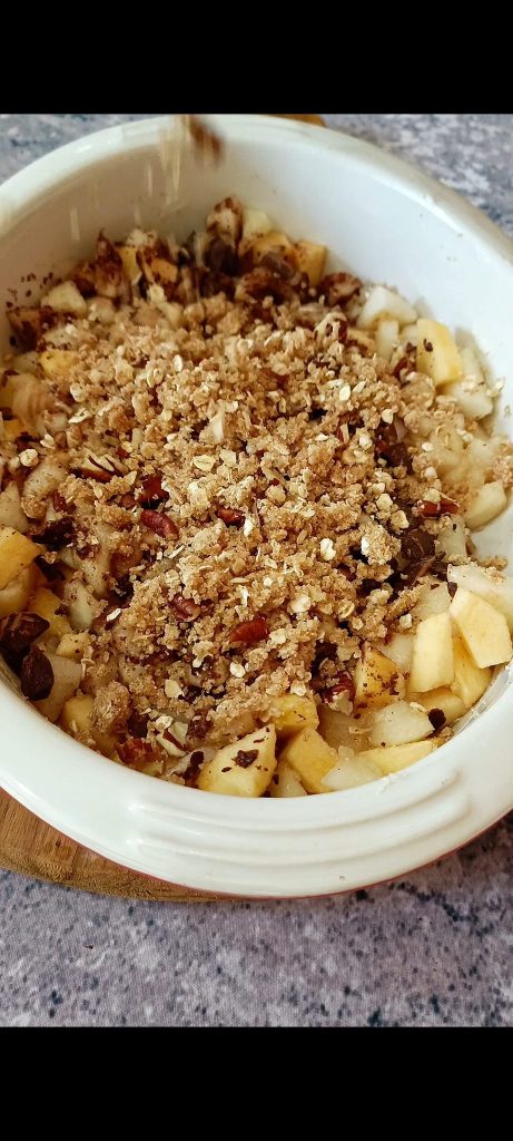 Spread the crumble over the pears