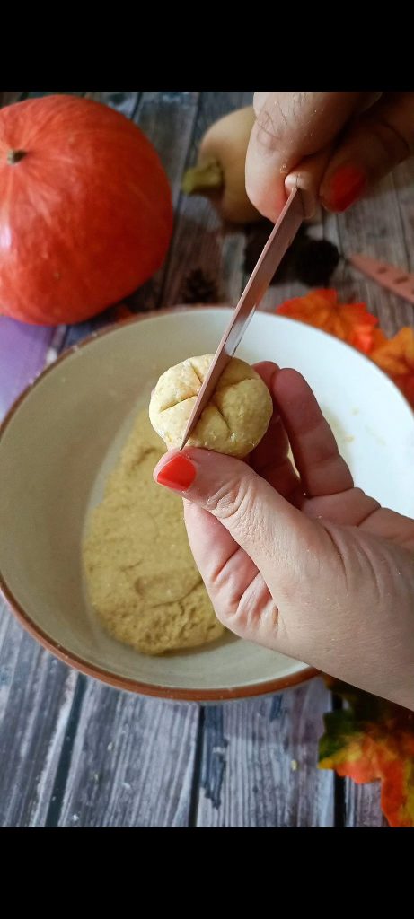 Make the pumpkin sections with a knife
