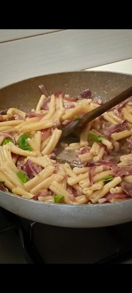We toss the pasta with all the ingredients