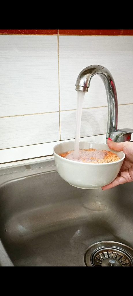 Wash the red lentils