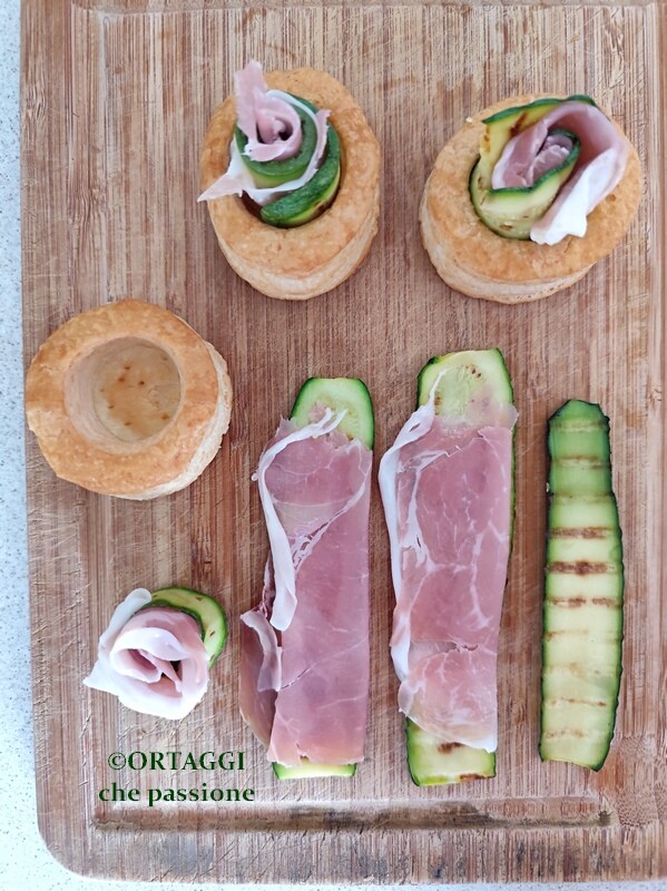 assembling vol au vent with vegetables and cold cuts