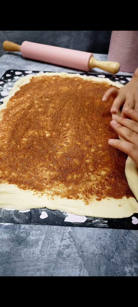 Roll up the rectangle to form a roll