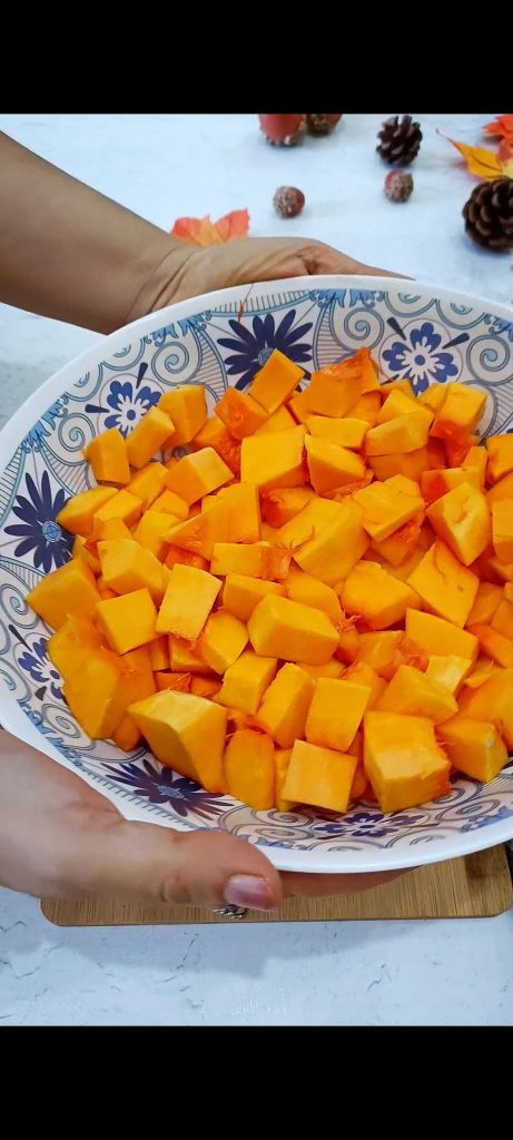 Cutting the pumpkin into cubes