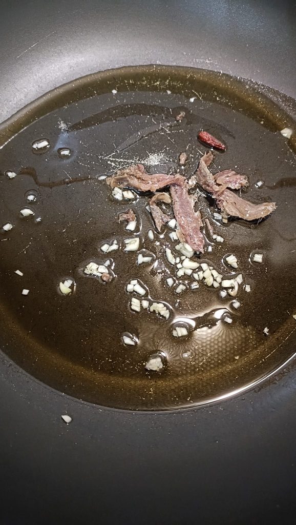 Garlic, oil, chili pepper, and anchovies