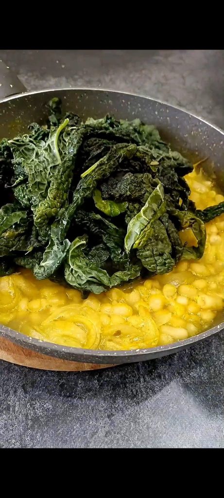 Adding black kale to beans