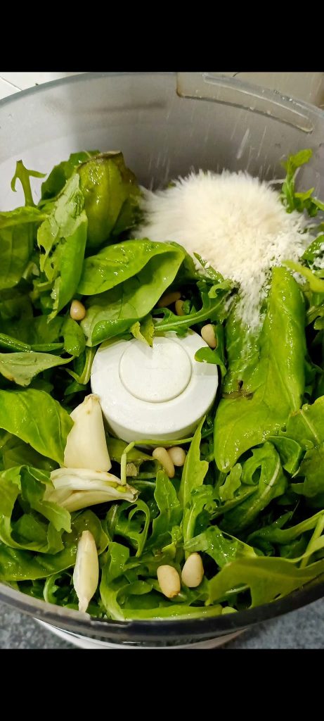 Arugula, garlic, basil, grated cheese, and oil