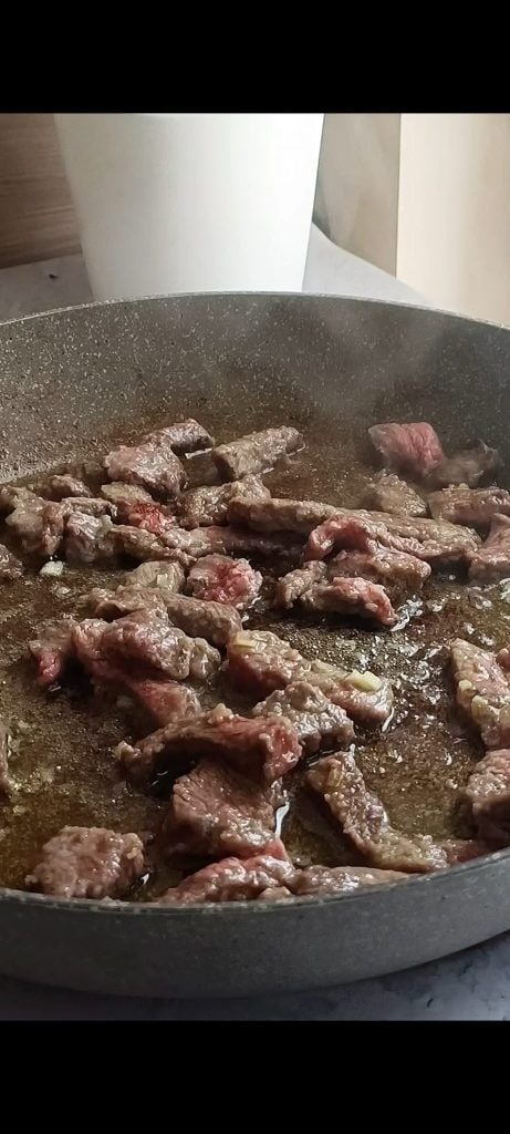Meat strips in pan