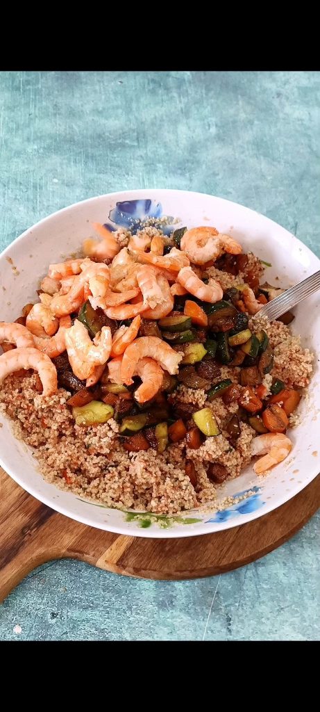 Adding All Ingredients to Couscous