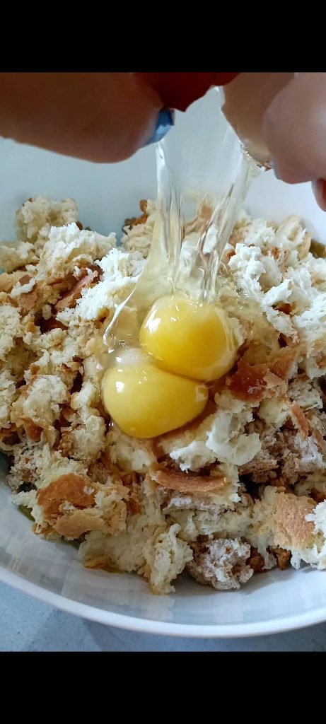 Combine bread and eggs