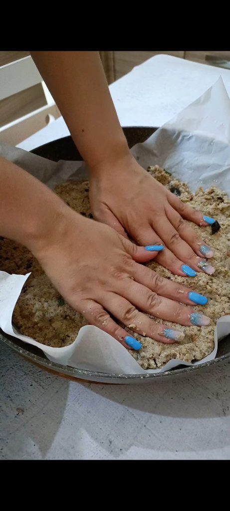 Half the dough in the skillet