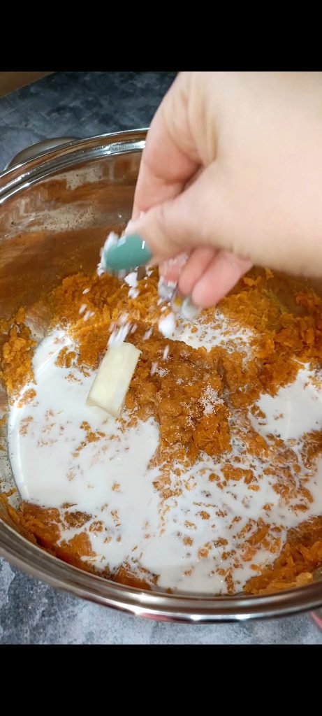 Add butter, milk, nutmeg, salt, and pepper