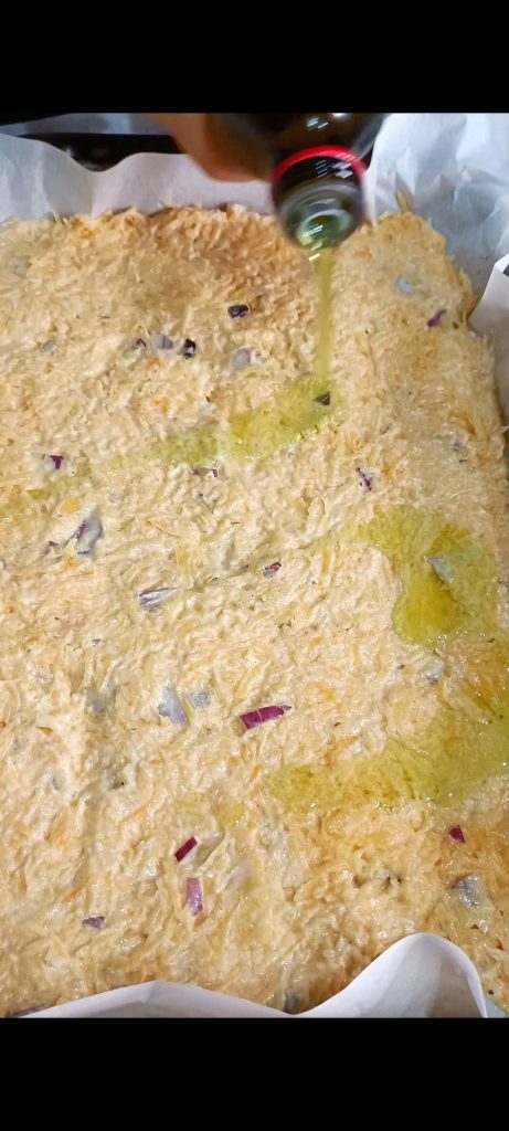 Pouring the mixture into a baking tray