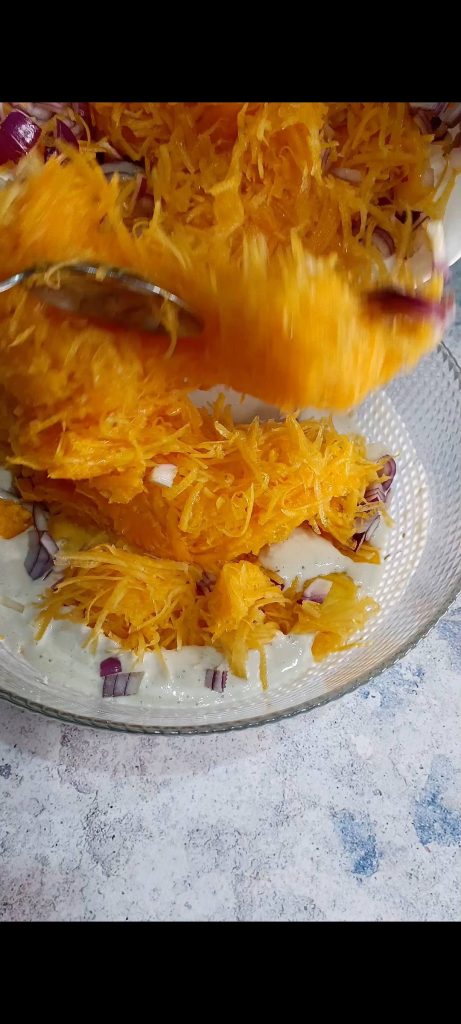Adding the grated pumpkin