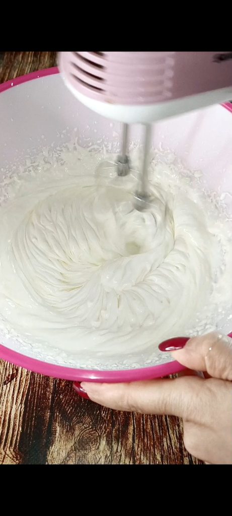 We whip cream, powdered sugar, and mascarpone
