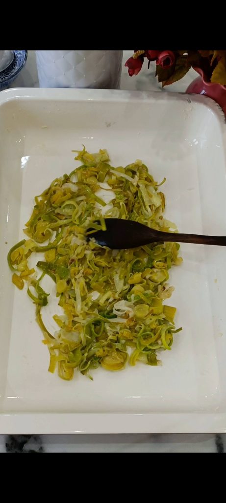 Transfer them to a buttered baking dish