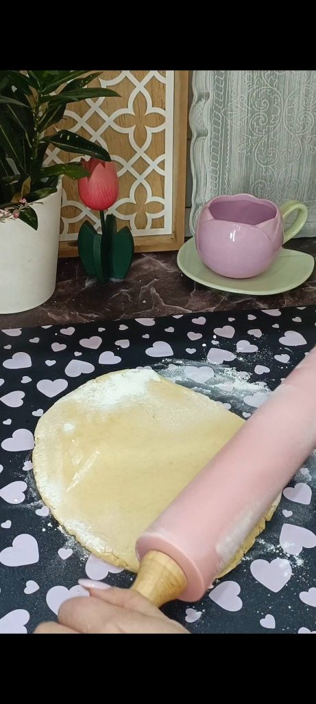 Roll out the dough with a rolling pin