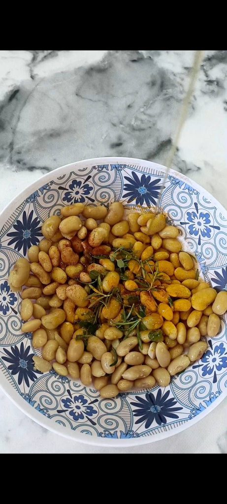 Season the beans and bake them until crispy