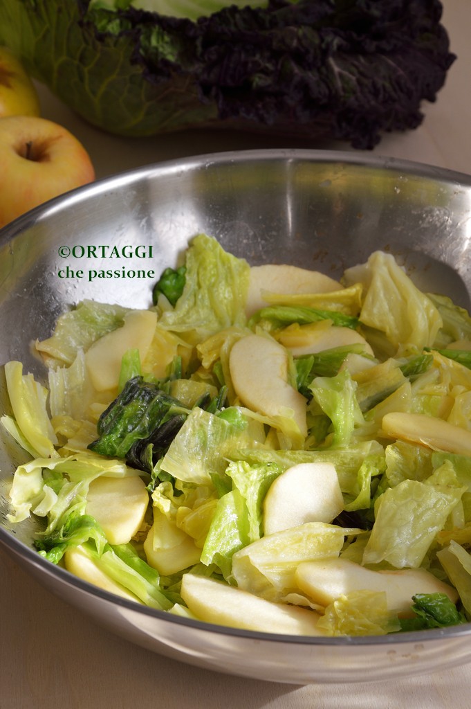 cabbage and apple in a wok pan