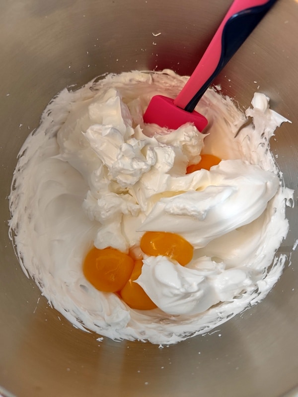 AA egg whites whipped with sugar and then yolks