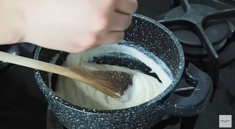 Adding nutmeg to the béchamel