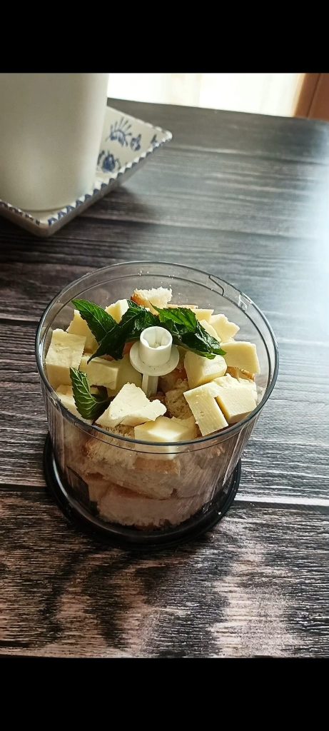Bread with almonds, mint, cheese, garlic, lemon zest