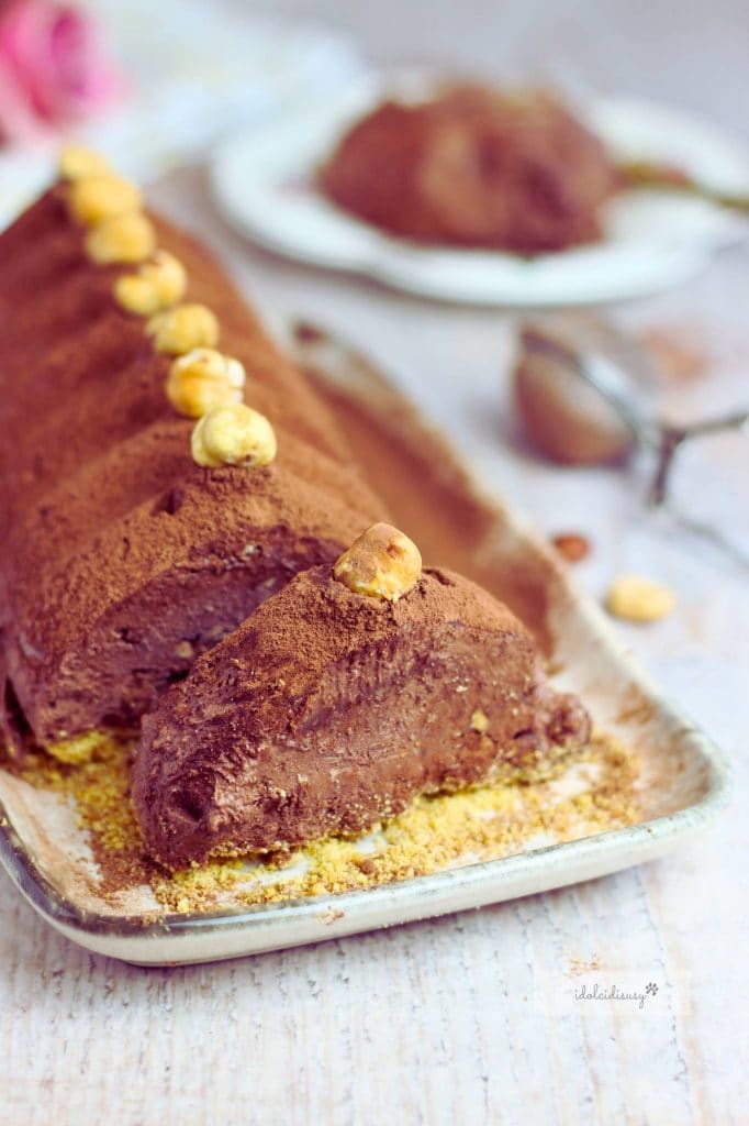 Chocolate and Hazelnut Semifreddo decorated with cocoa and whole hazelnuts