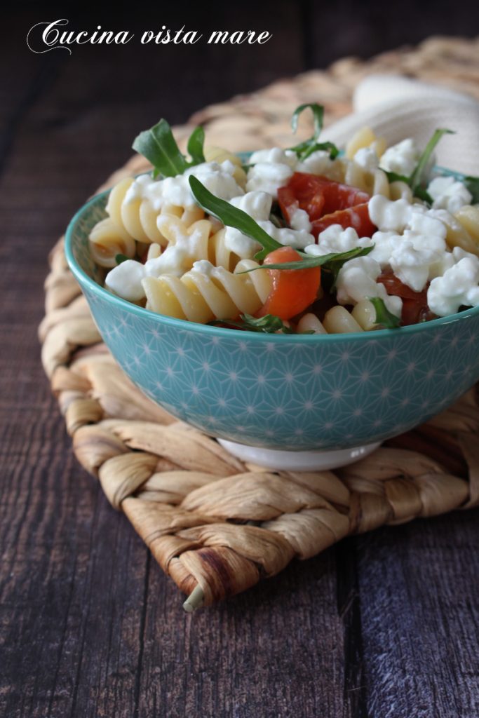 Cold pasta with arugula and cherry tomatoes Sea view kitchen