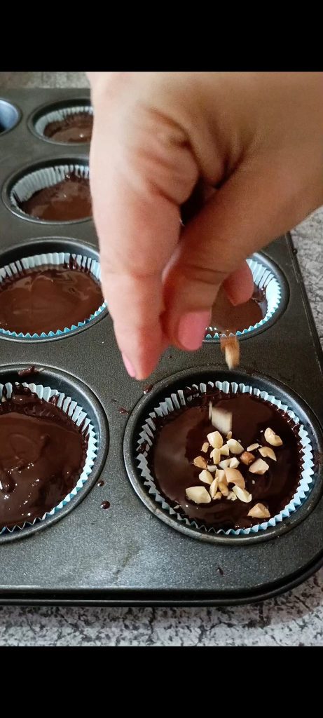 Cover with remaining chocolate and peanut crumbs