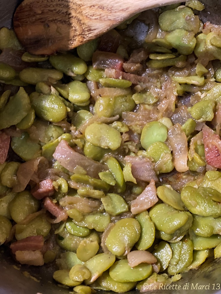 Creamy pappardelle with cooked broad beans, chicory, and ricotta