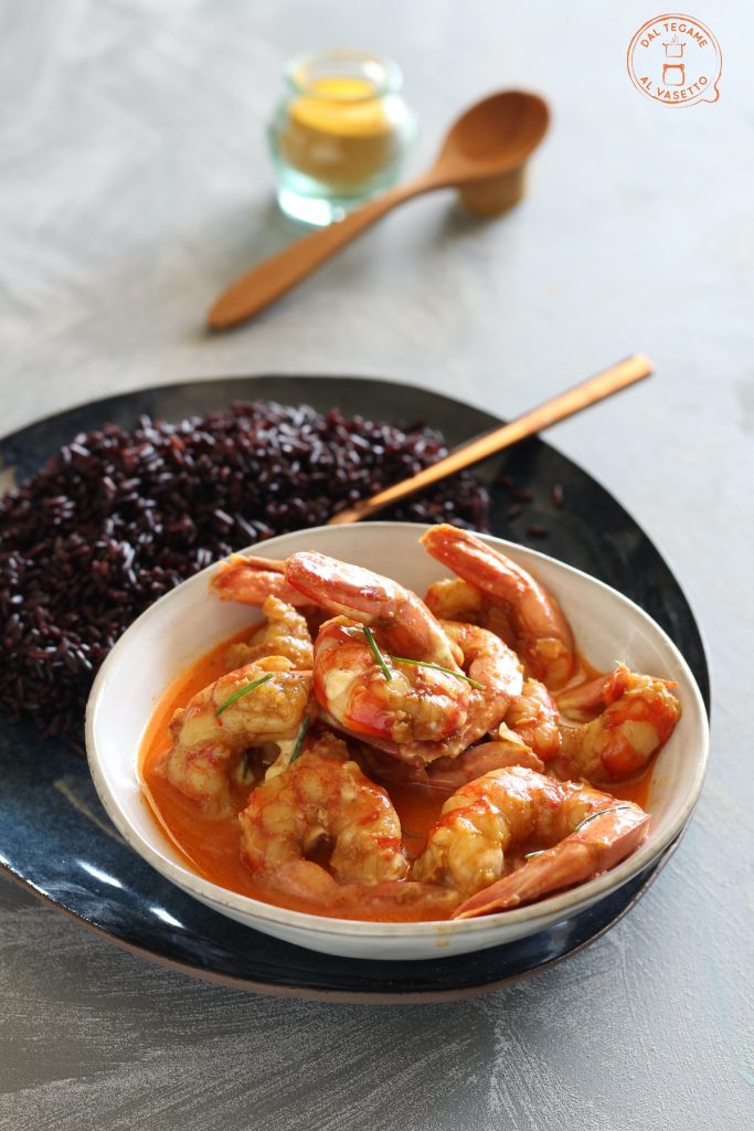shrimp cooked in a jar with curry and yogurt cooked in microwave jar cooking accompanied by black rice