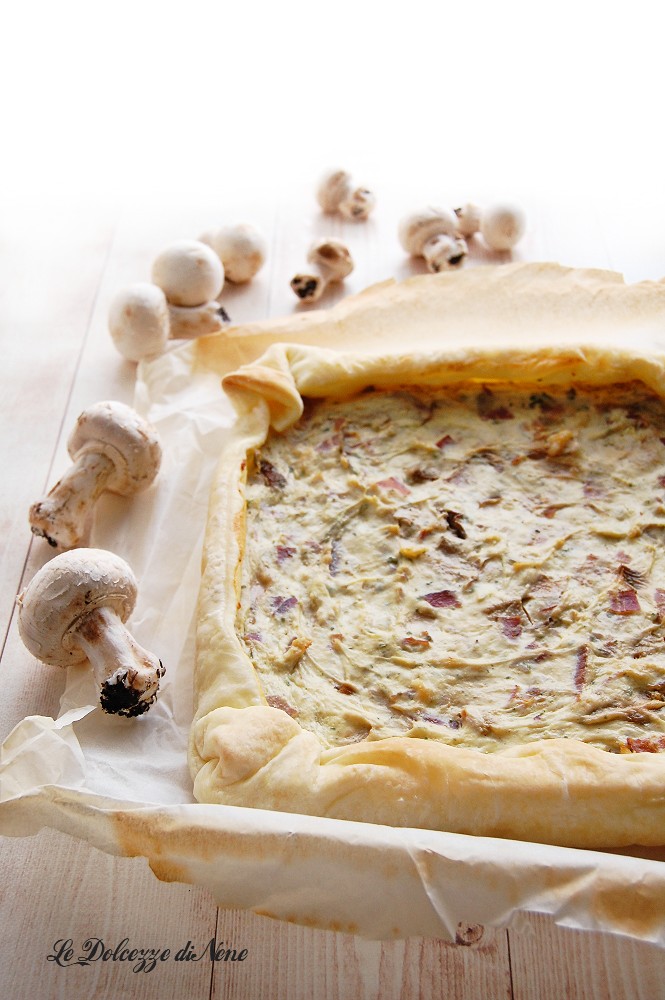 savory pie with ricotta, mushrooms, and speck