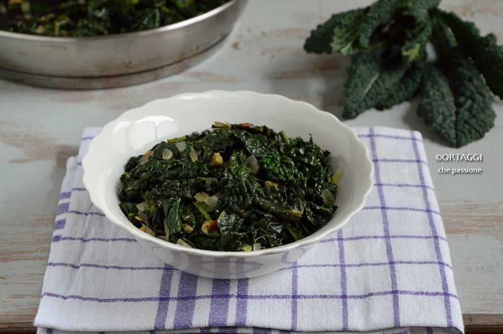 Delicious black kale in a pan vegetables with passion
